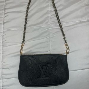 Louis Vuitton small black purse